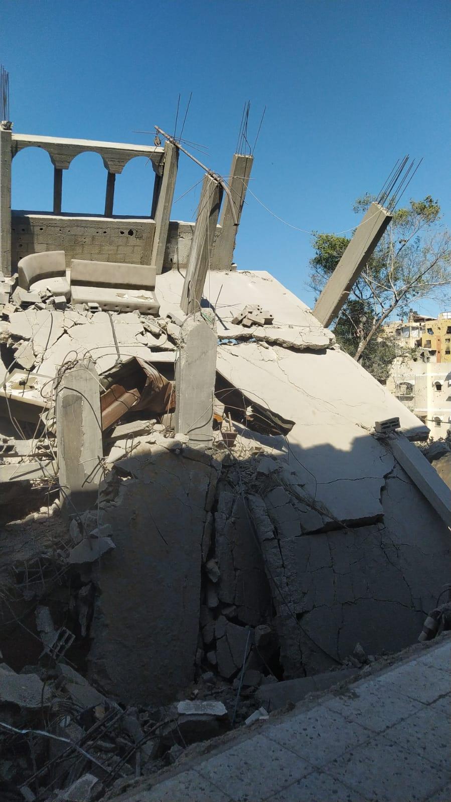 The house was completely destroyed, reduced to a pile of concrete debris.