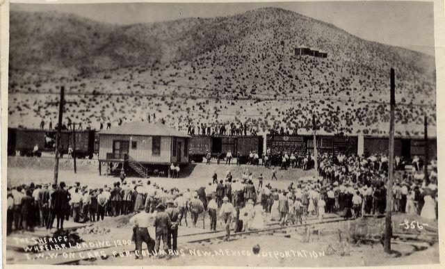 Striking miners and others being deported from Bisbee on the morning of July 12, 1917. The men are boarding the cattle cars provided by the El Paso and Southwestern Railroad. By Published as a postcard circa 1917. Original photographer and publisher not known. - http://www.vintagephoto.com/collection/7-05images/, Public Domain, https://commons.wikimedia.org/w/index.php?curid=56840312